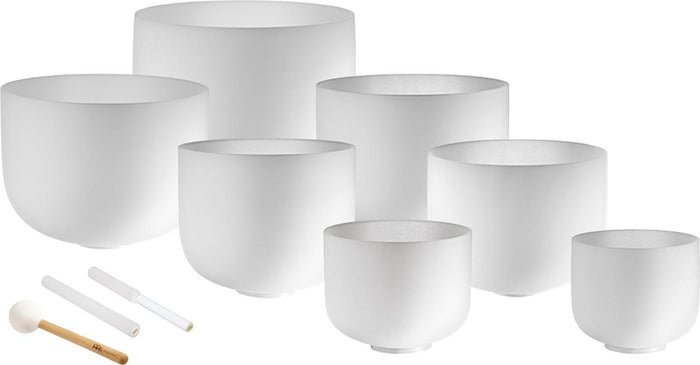Set de sept bols chantants en cristal blanc givré pour les chakras